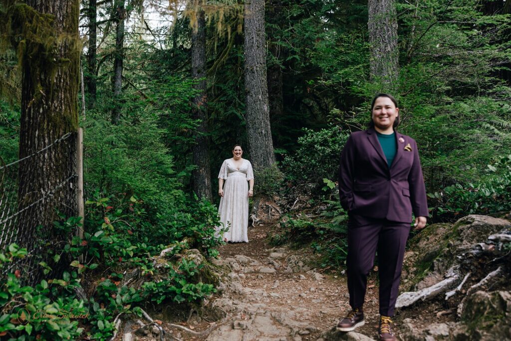 elopement couple first look surrounded by lush forests