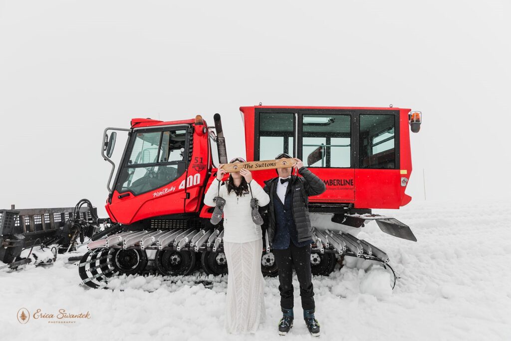 bride and groom drinking shots together during their winter elopement at mt. hood