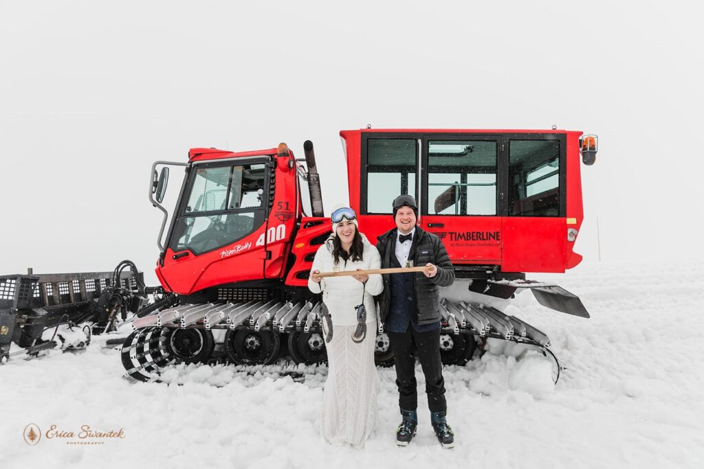 bride and groom drinking shots together during their winter elopement at mt. hood