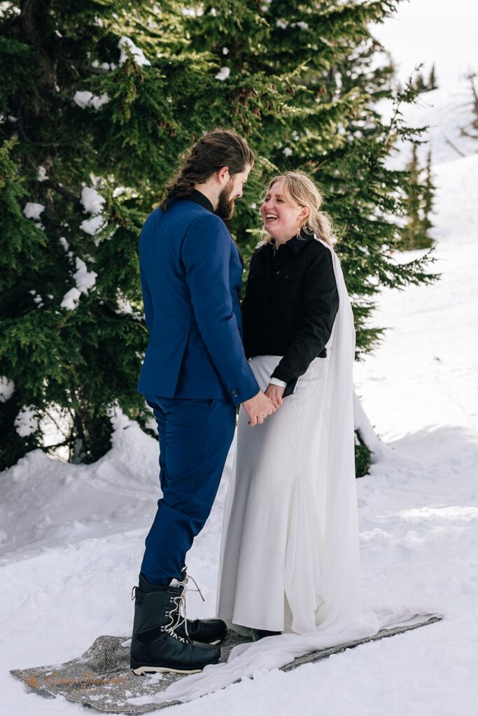 candid winter elopement ceremony on the mountain at mt. hood