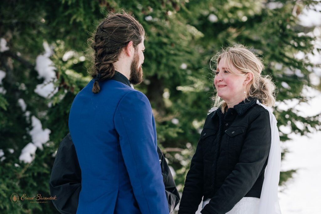 candid winter elopement ceremony on the mountain at mt. hood