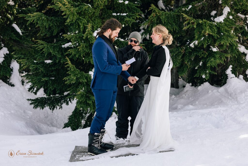 candid winter elopement ceremony on the mountain at mt. hood