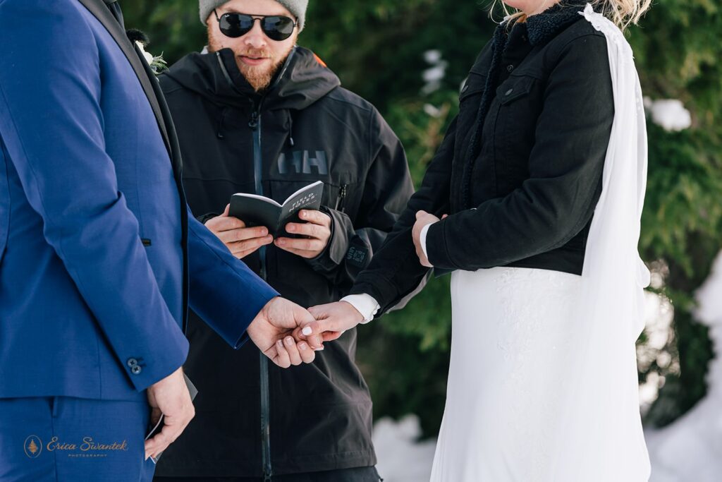 candid winter elopement ceremony on the mountain at mt. hood
