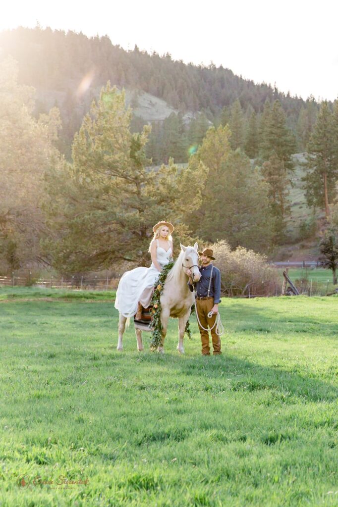 bride riding horseback during their Oregon elopement at Ochoco Mountains