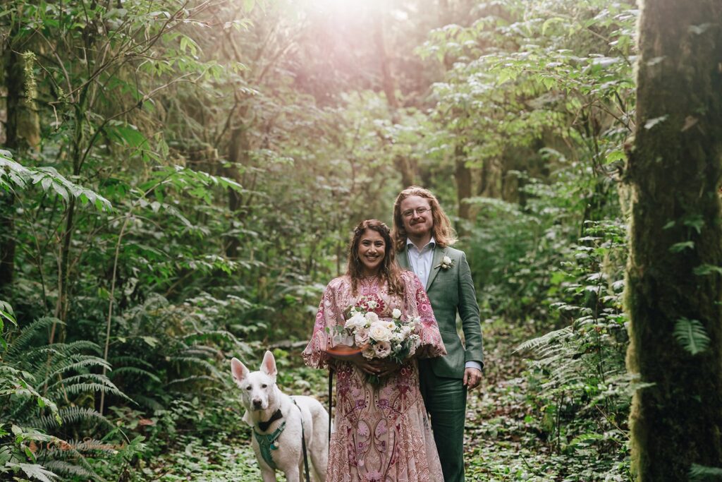 elopement couple hiking through the Ghost Forest in Oregon