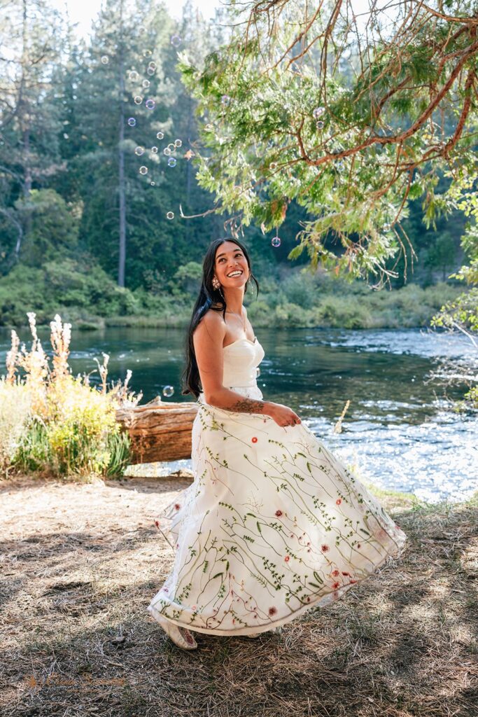 bride in a floral wedding dress during their Camp Sherman elopement in Oregon