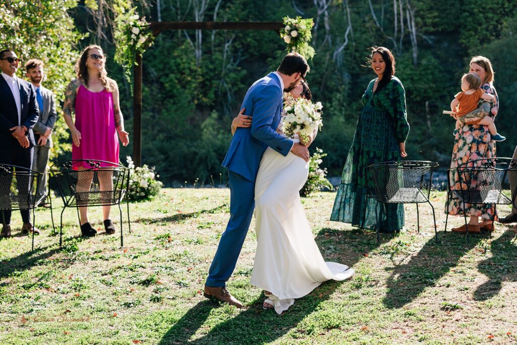 candid intimate wedding ceremony at chetco river inn