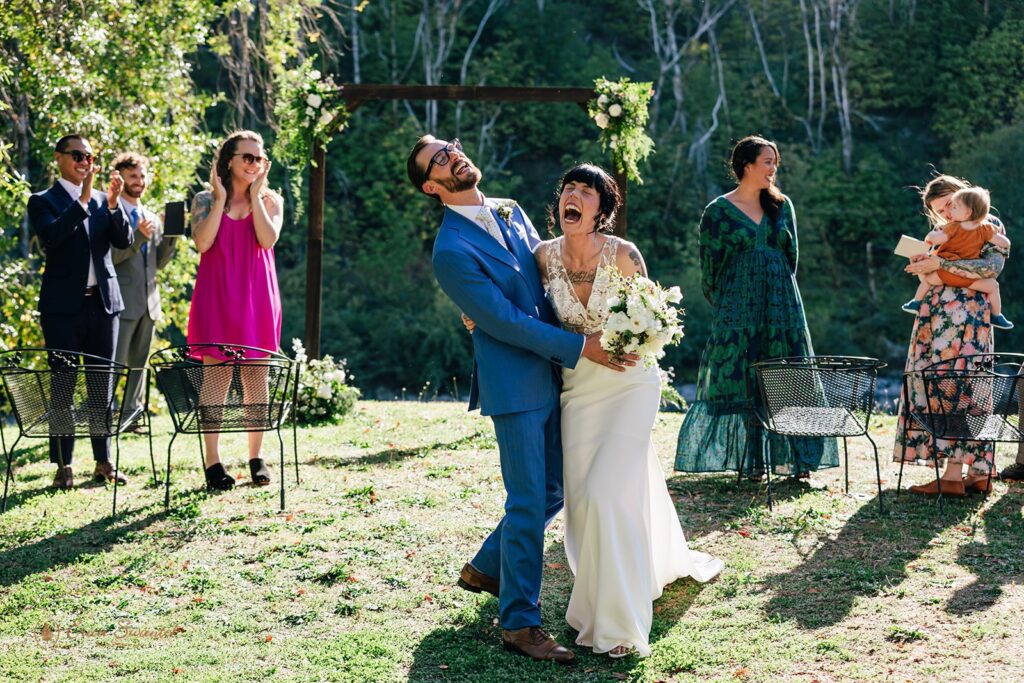 candid intimate wedding ceremony at chetco river inn
