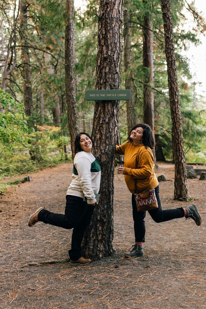 couple hugging a tree together