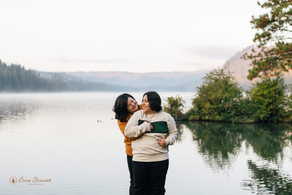 sweet couple hugging by suttle lake