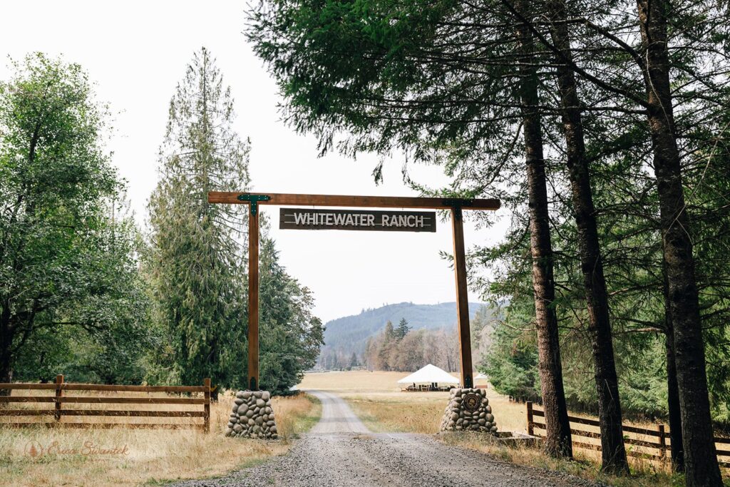 sign to whitewater ranch, forest wedding venue in oregon