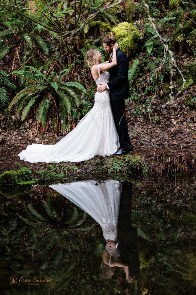 romantic bride and groom surrounded by lush forests during their Belknap Hot Springs elopement