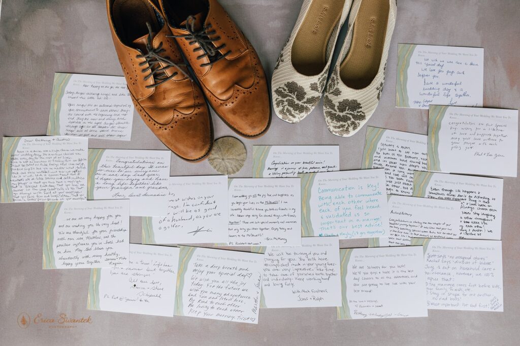 classy elopement detail shot of shoes and sweet notes from the family