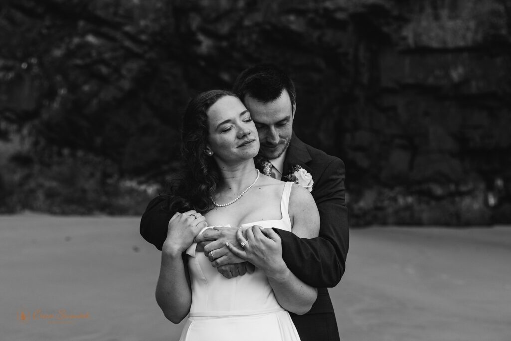 bride and groom hugging during their oregon coast micro wedding