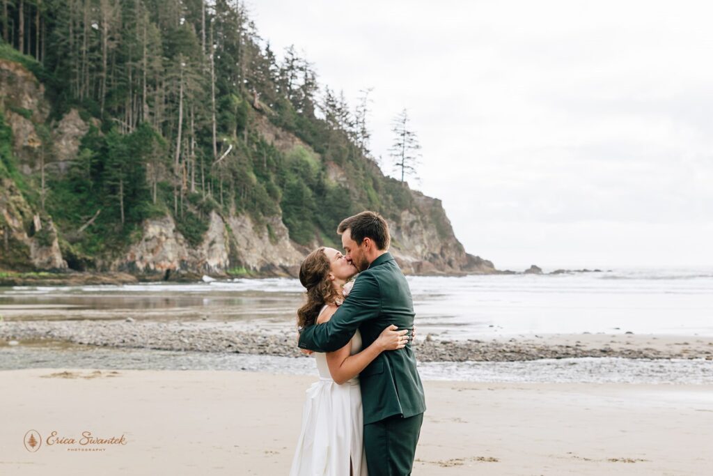 bride and groom first kiss