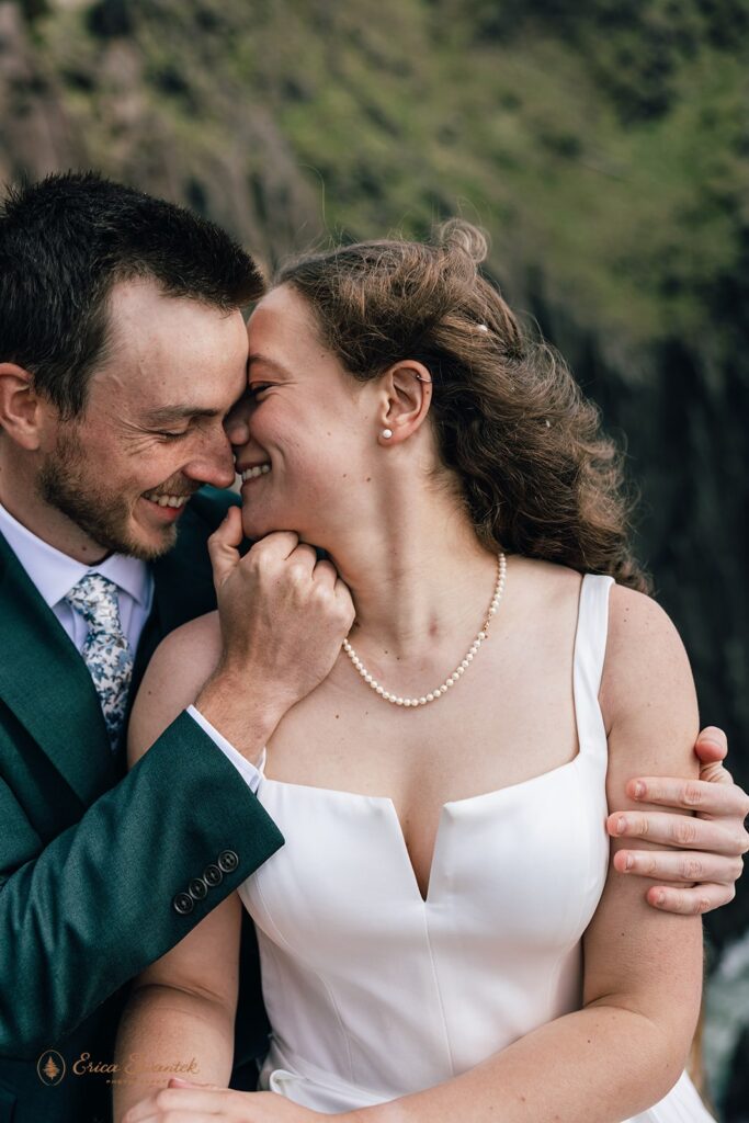 bride and groom kissing during their dreamy oregon coast micro wedding