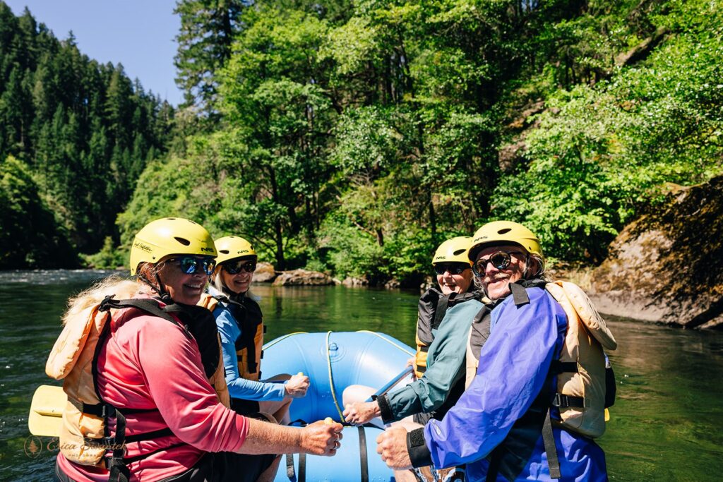 people enjoying rafting together