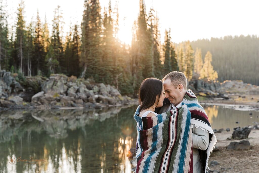 bride and groom wrapped in a blanket together during their bend, oregon elopement