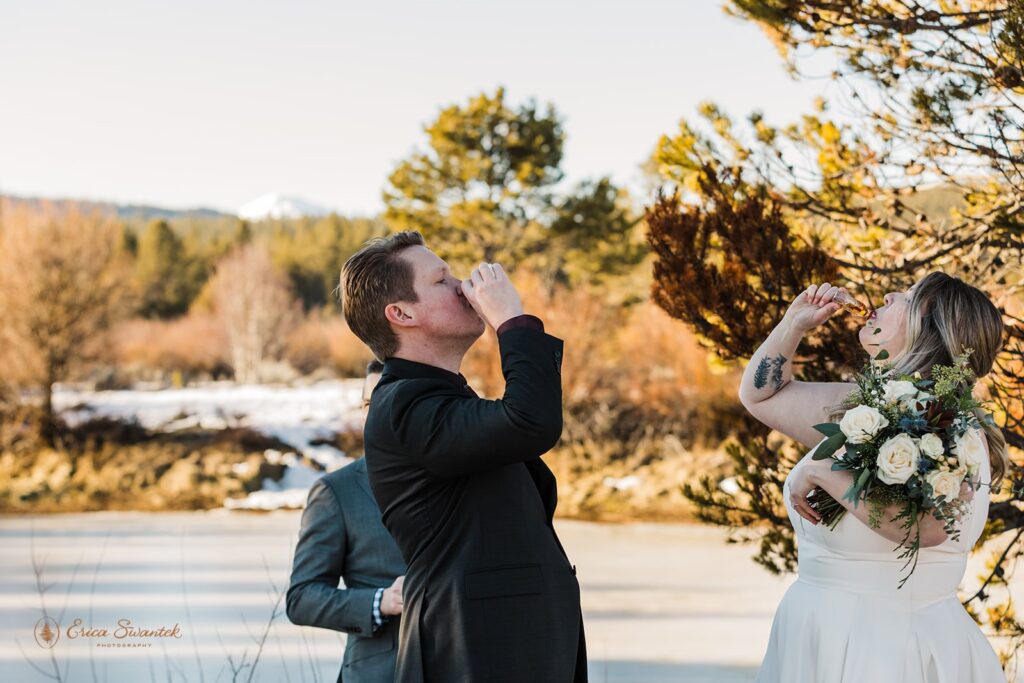 bride and groom taking shots during their elopement ceremony