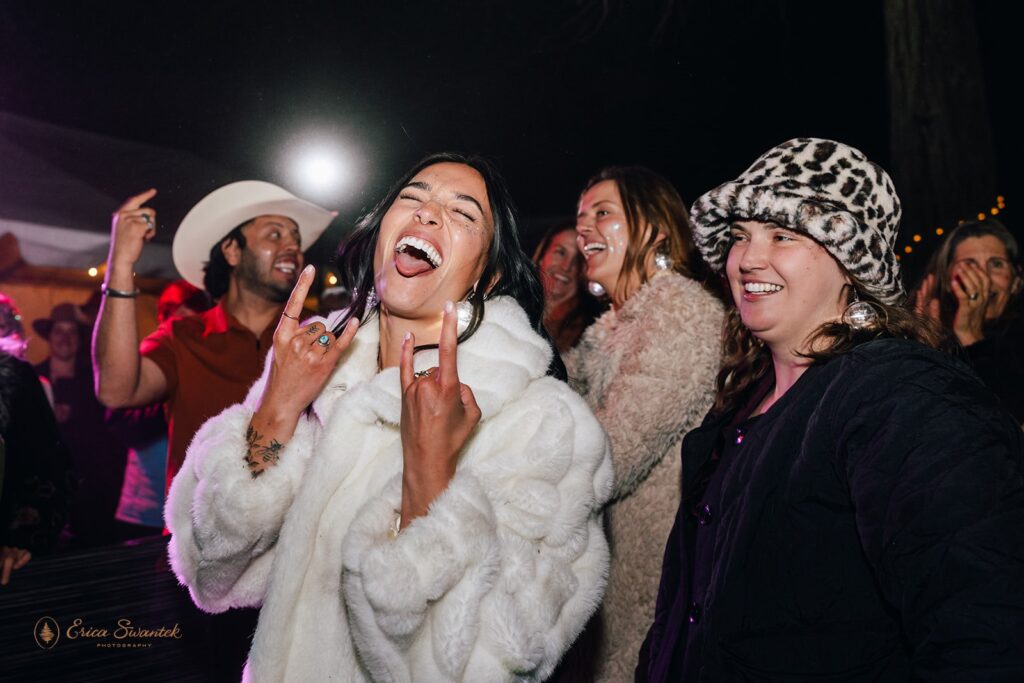 fun bride and guests during wedding reception
