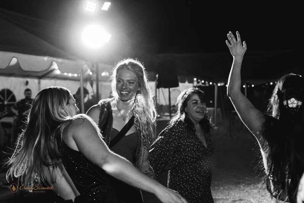 fun bride and guests during wedding reception