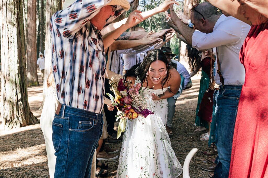 newlyweds celebrating with their loved ones after ceremony