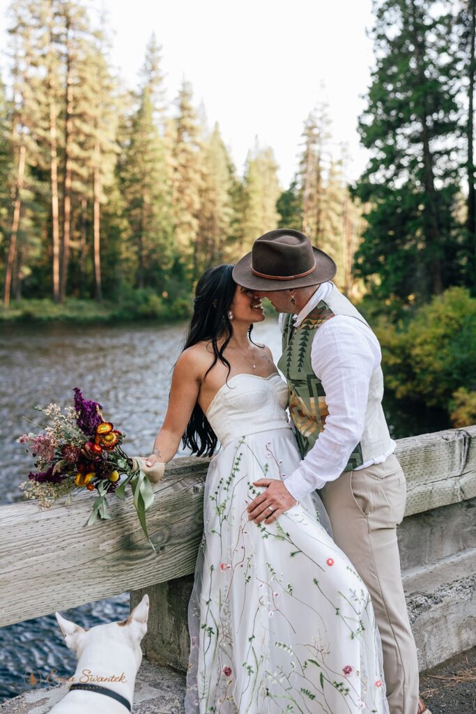 romantic bride and groom moment along metolius river