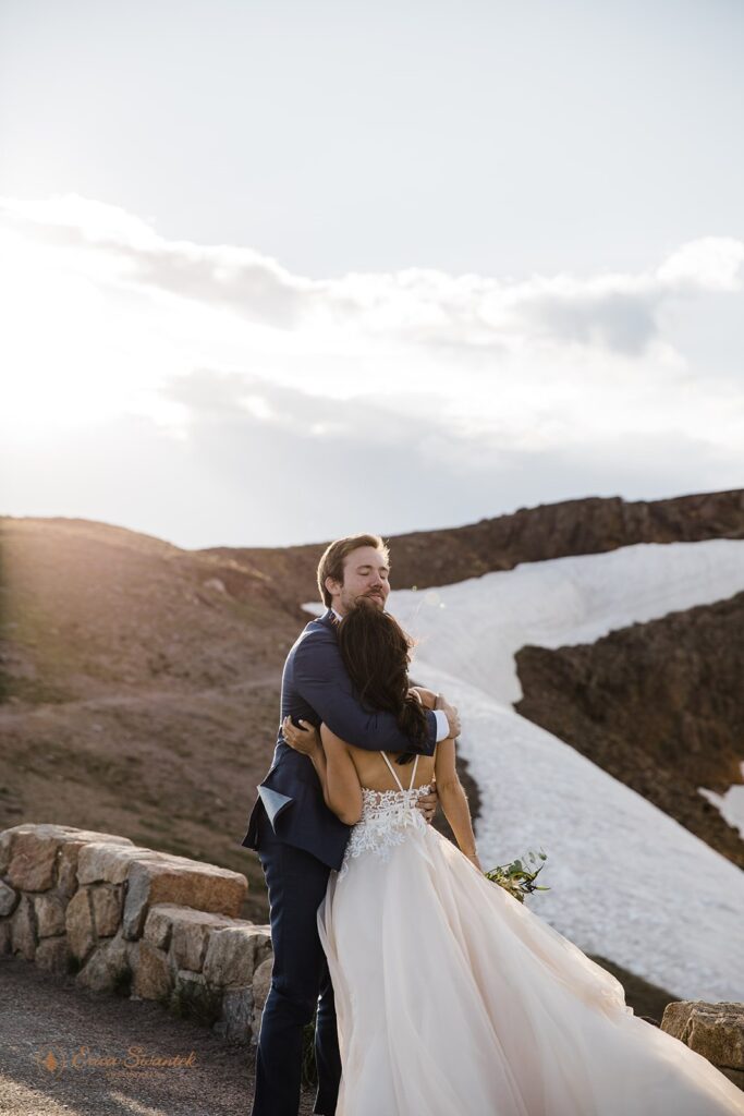 adventurous elopement couple hugging at the Lava Cliffs in RMNP