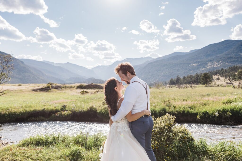 sweet elopement couple almost kissing during their rocky mountain national park elopement