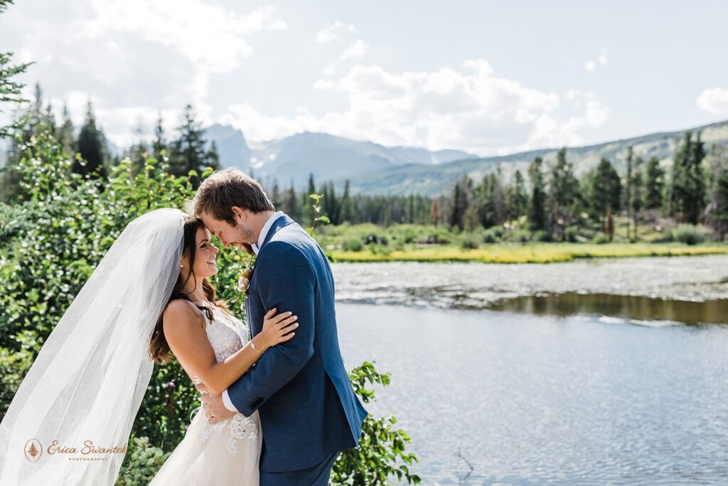 sweet elopement couple almost kissing during their rocky mountain national park elopement