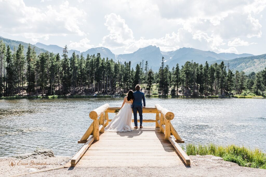 elopement couple overlooking sprague lake in rmnp