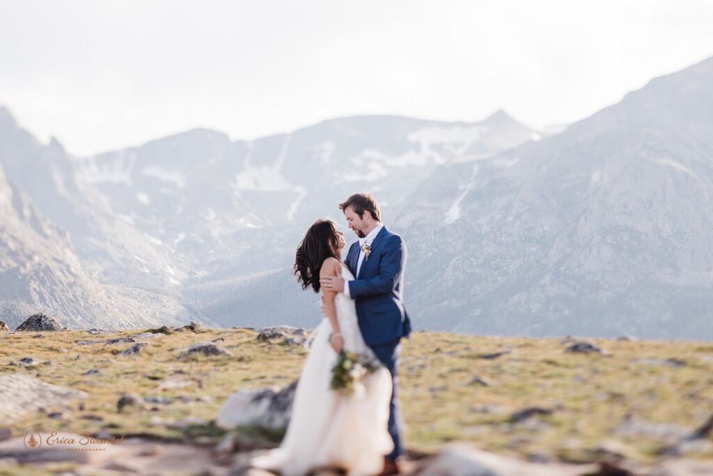 adventurous elopement couple hugging in UTE trail in RMNP