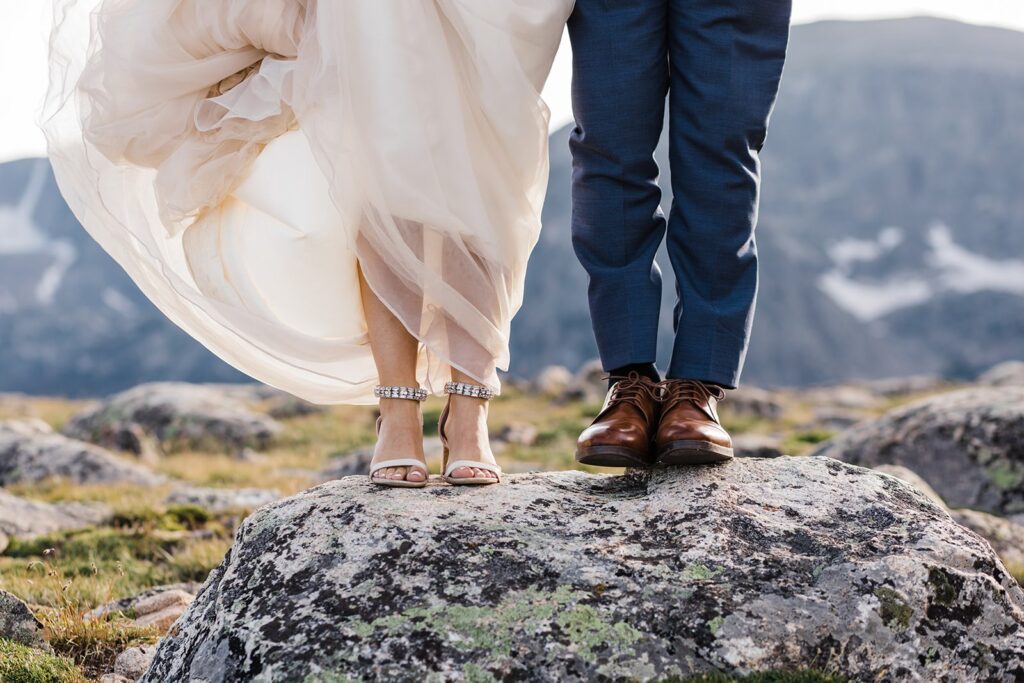 close up of bride and groom's footwear