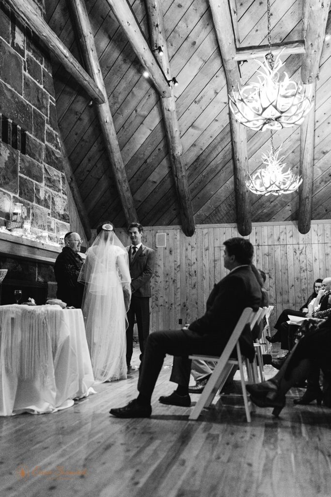 candid indoor wedding ceremony moments at the fireside room in sunriver resort