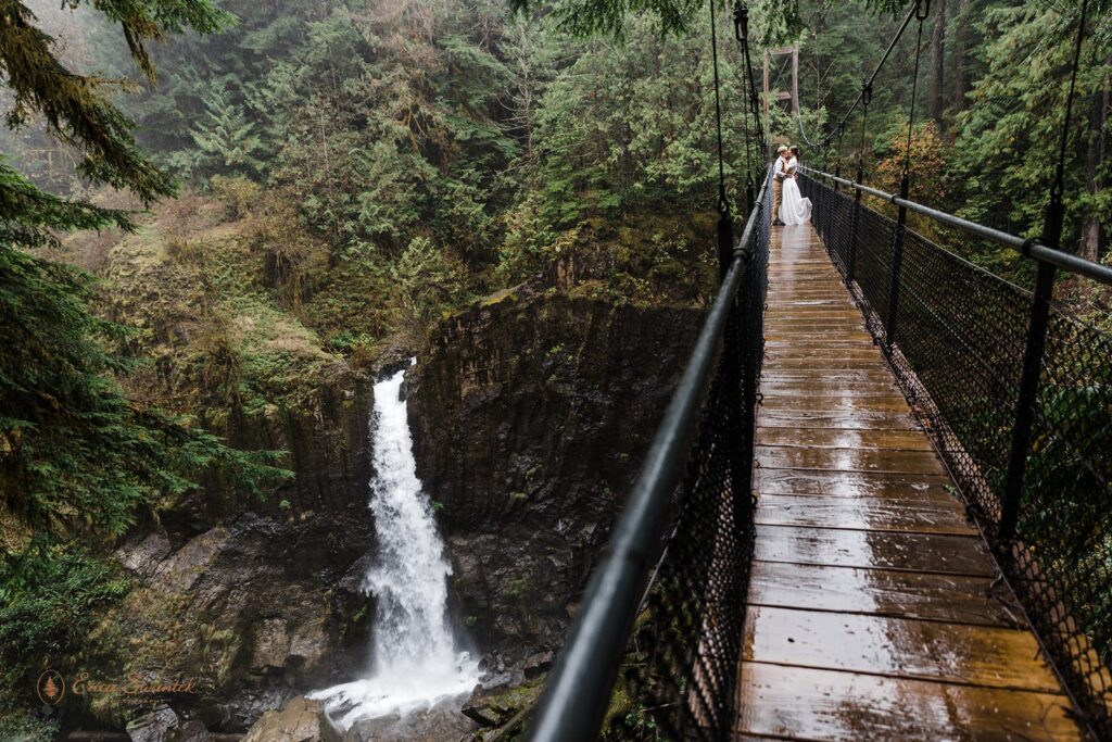 Rainy waterfall elopement Oregon.