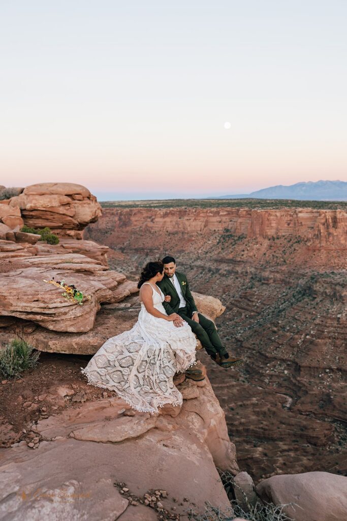 adventurous elopement couple at a desert viewpoint during their moab elopement
