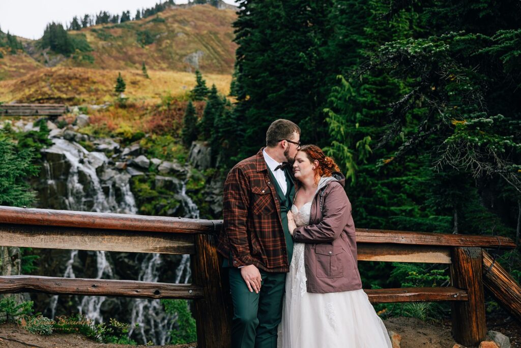 sweet bride and groom during their mt rainier waterfall elopement