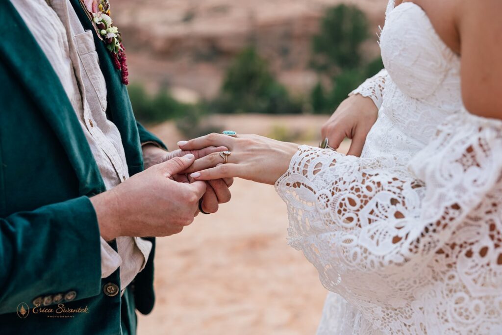 bride and groom exchanging rings