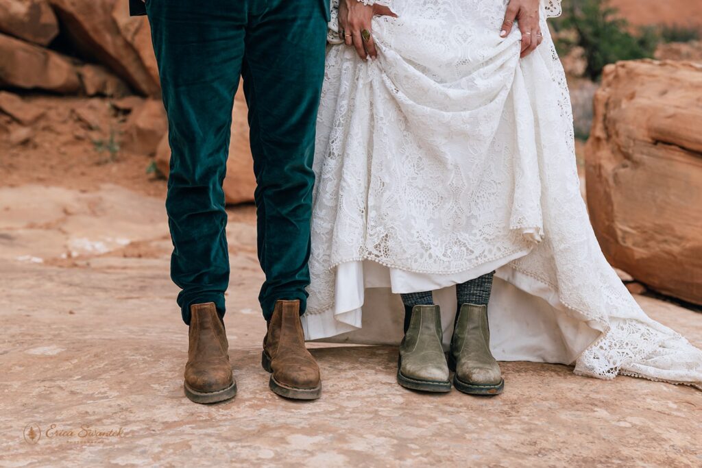 elopement couple showing off hiking boots