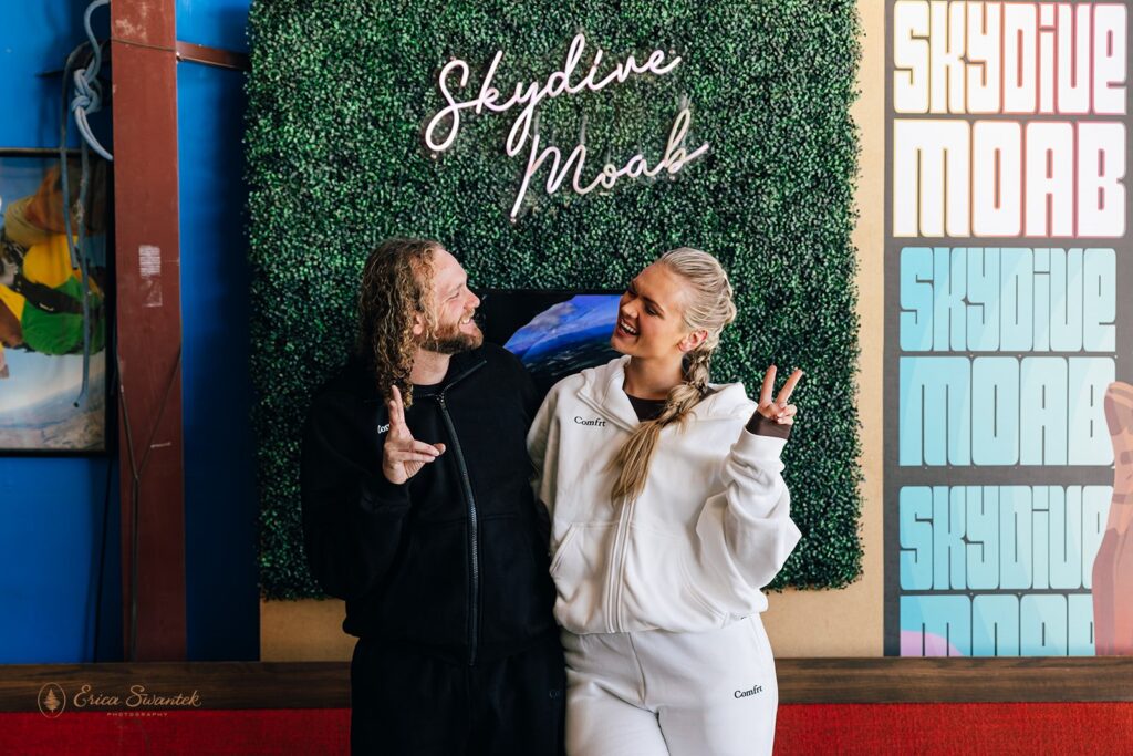 adventurous bride and groom getting ready for their skydiving wedding in moab