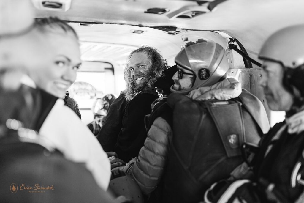 elopement couple on the plane ahead of the big jump