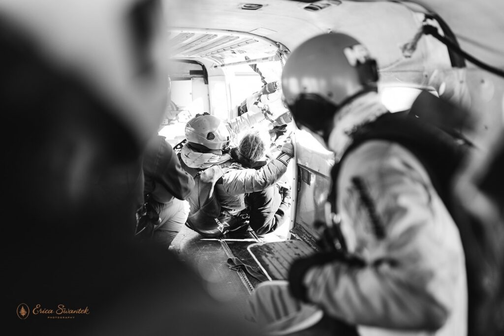 elopement couple on the plane ahead of the big jump