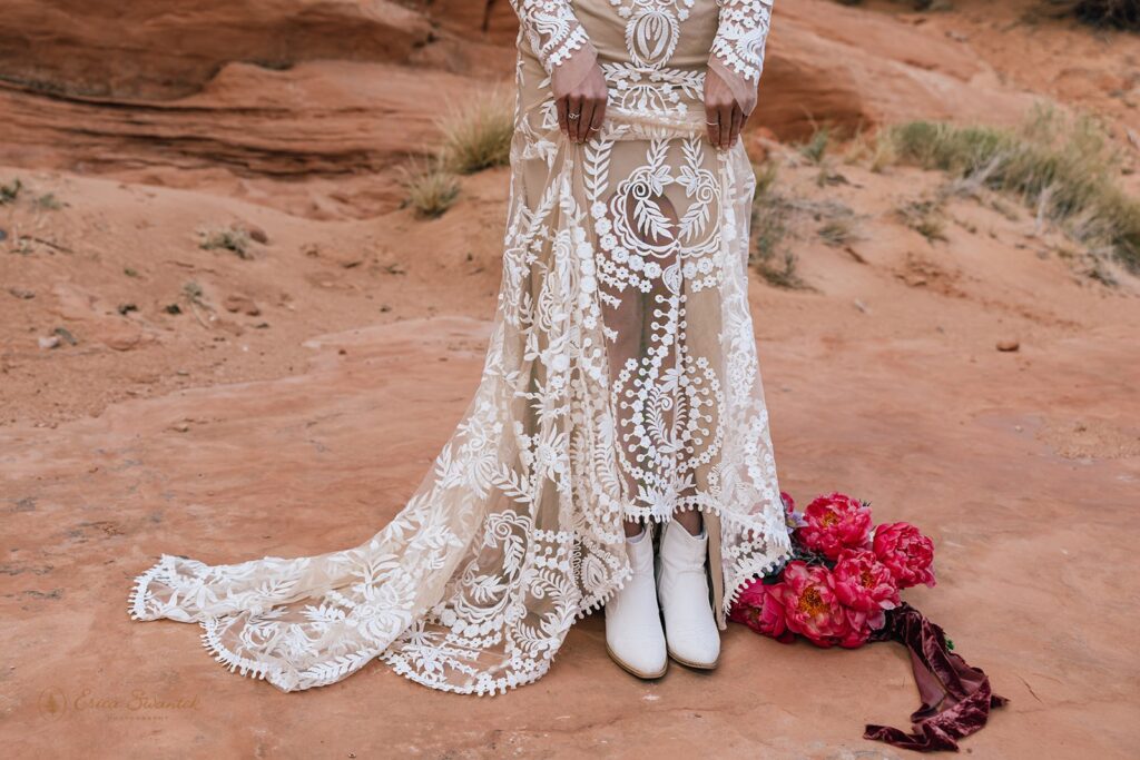 bride showing off her cute cowgirl boots