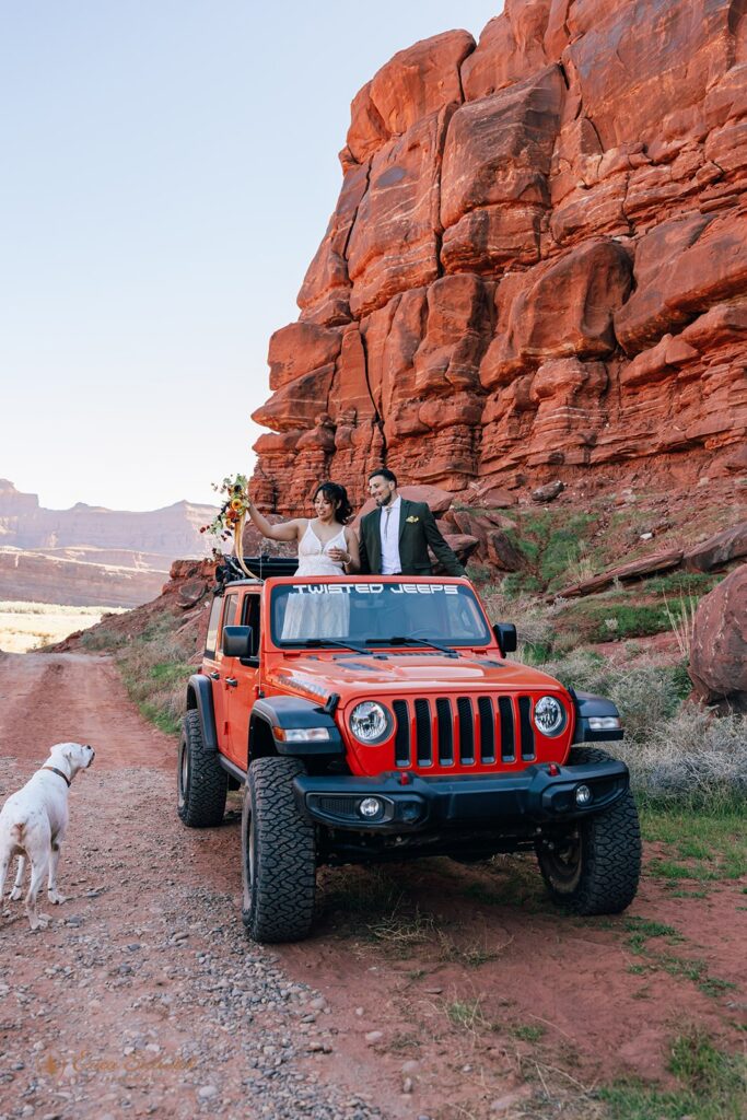 adventurous elopement couple in a jeep during their moab elopement