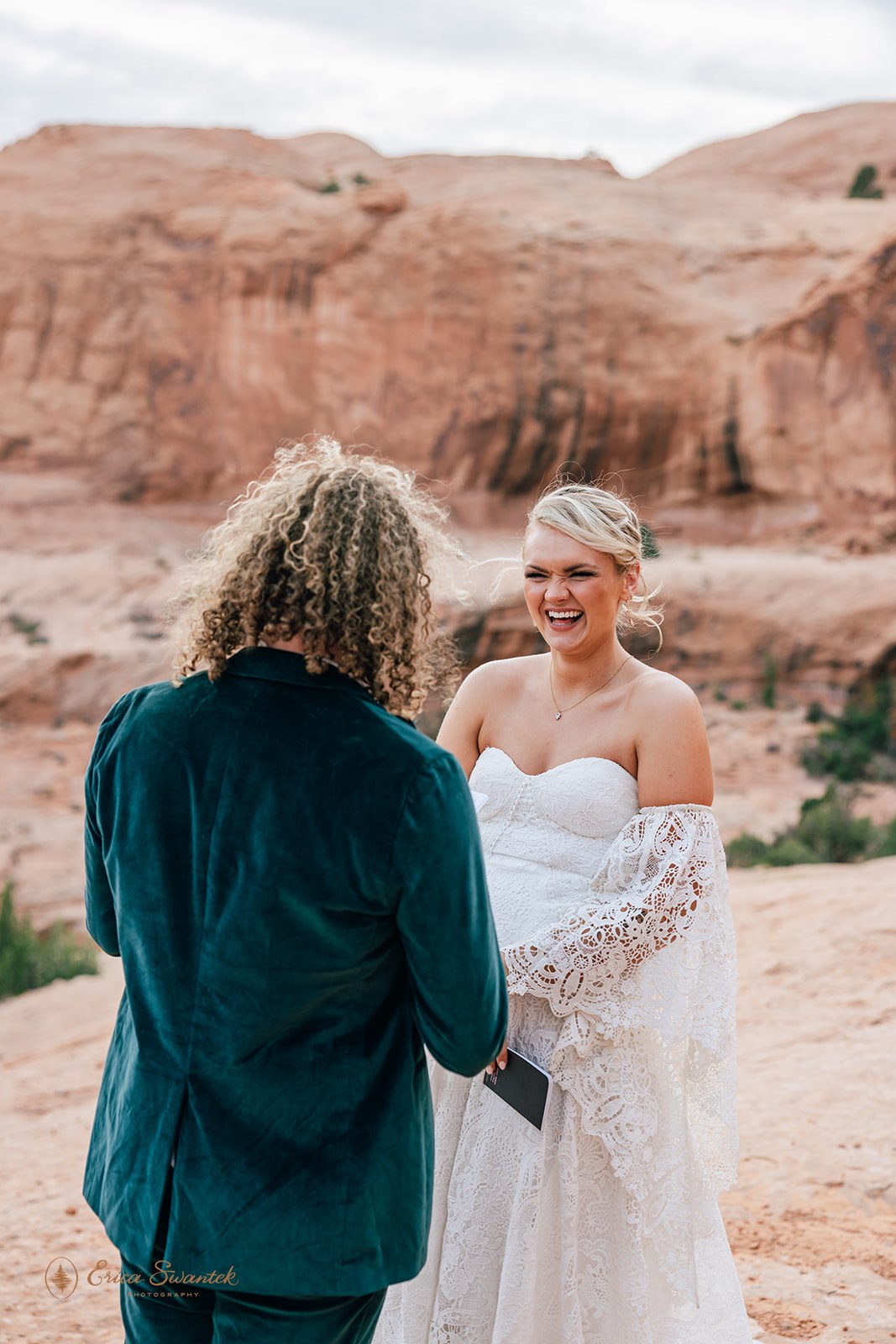 moab elopement ceremony surrounded by red rock landscapes