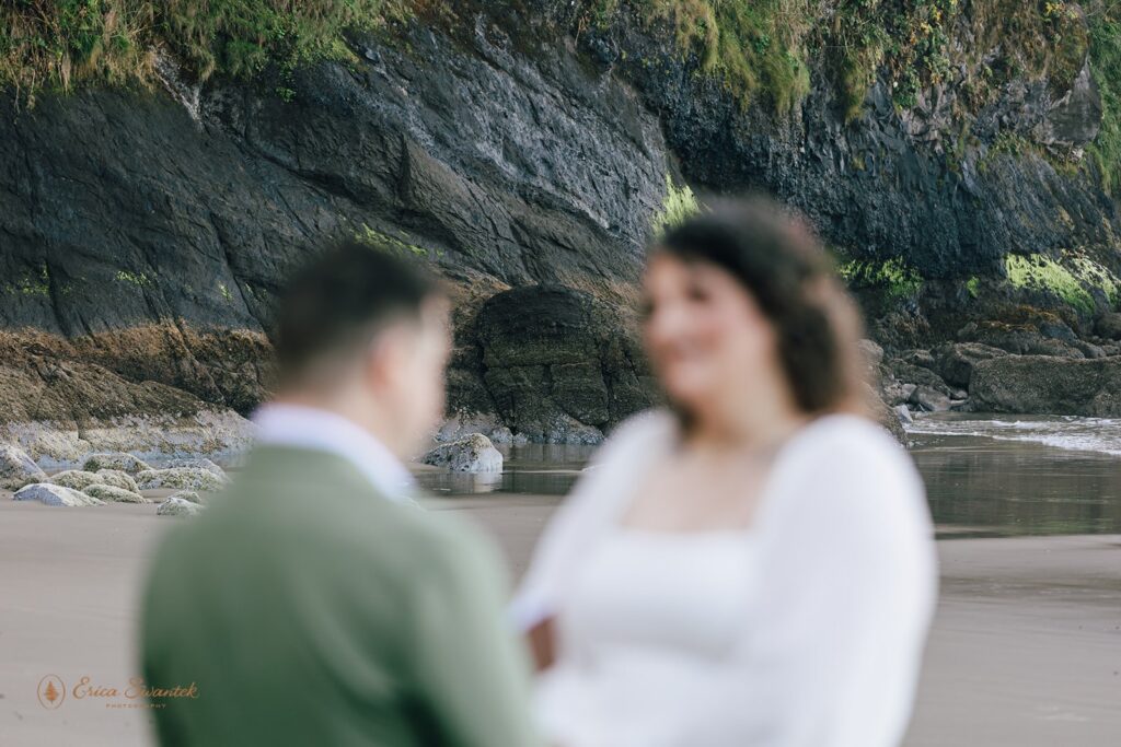 candid coastal elopement ceremony in the pnw