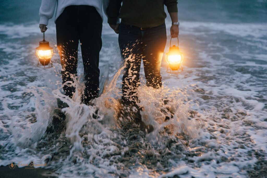 adventurous elopement couple walking in the ocean during their pnw elopement