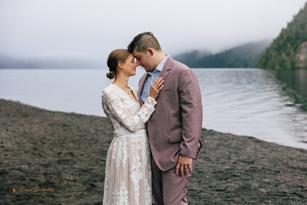 romantic elopement couple snuggling during their pnw elopement at the olympic national park