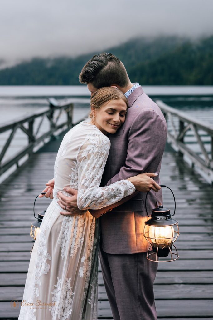 romantic elopement couple with lanterns during their pnw elopement at the olympic national park