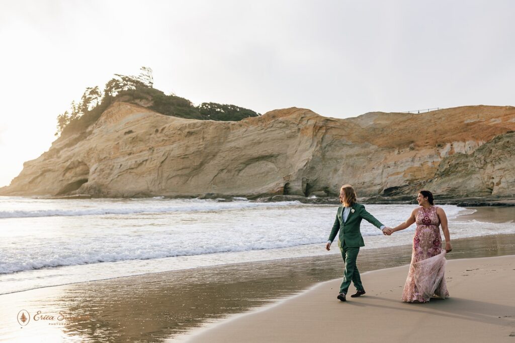 playful bride and groom during their oregon coast elopement in the pnw